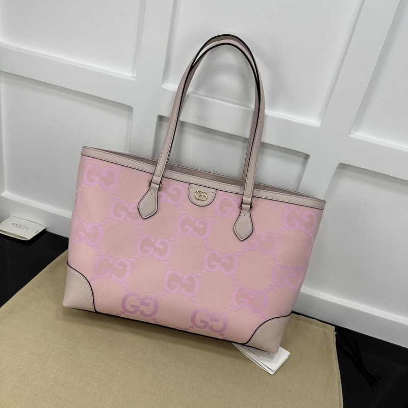G*u*i shopping bags